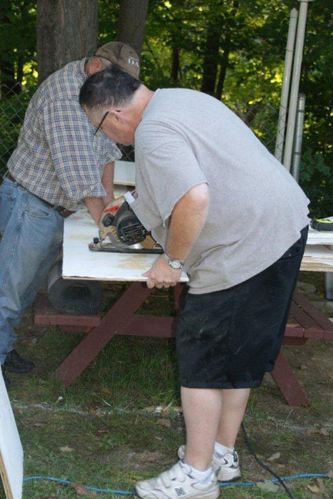 Pastor Bill working on tower louvers